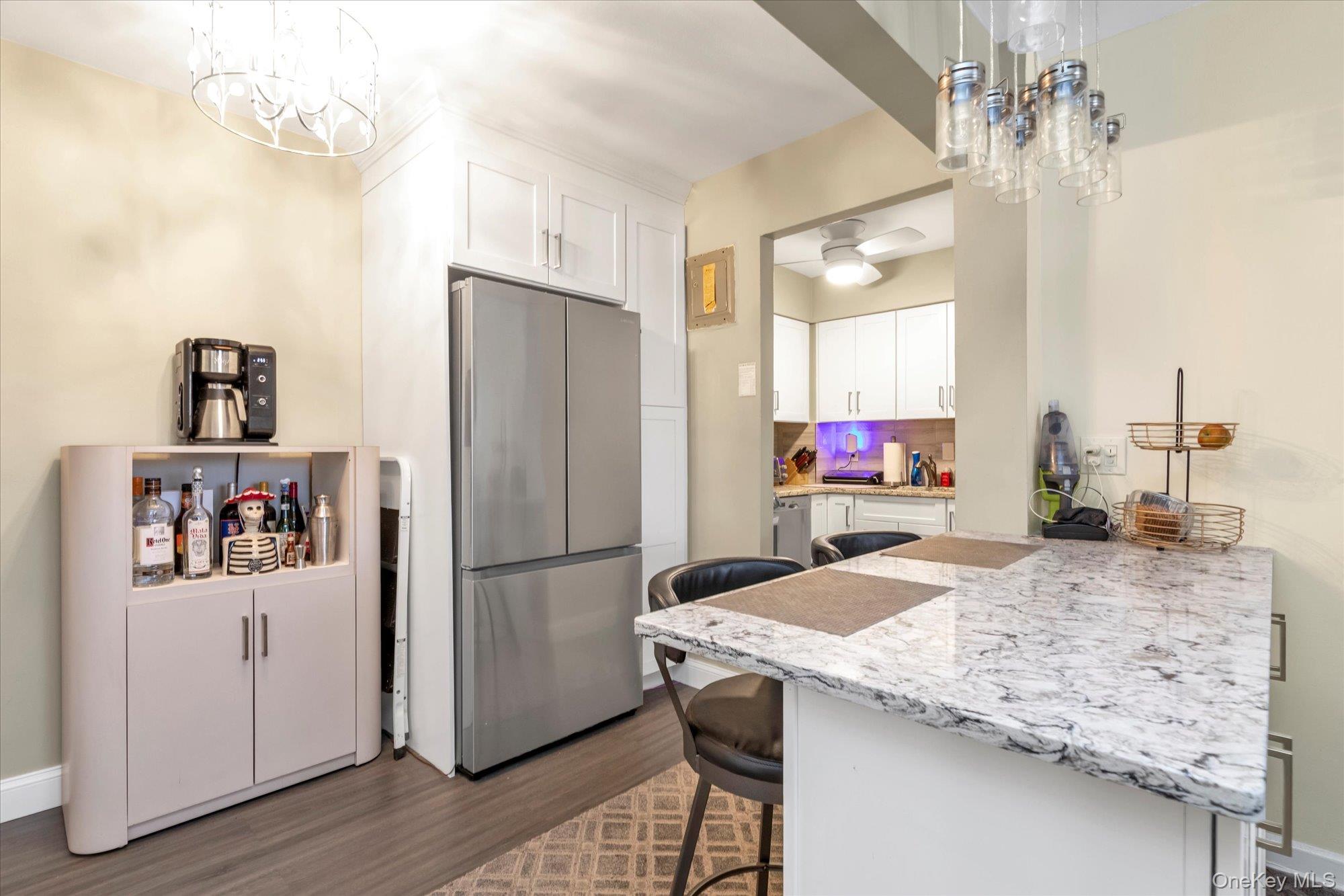 504 Merrick Road, Unit 3G Lynbrook, NY 11563 - Photo 6 of 19 Renovated Kitchen with Island and Granite Countertops