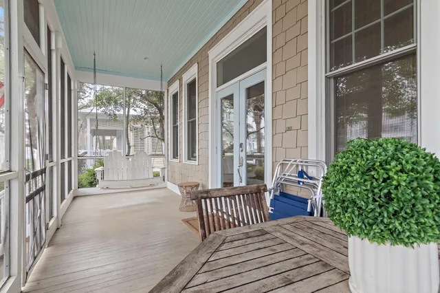 a balcony with view of outdoor space