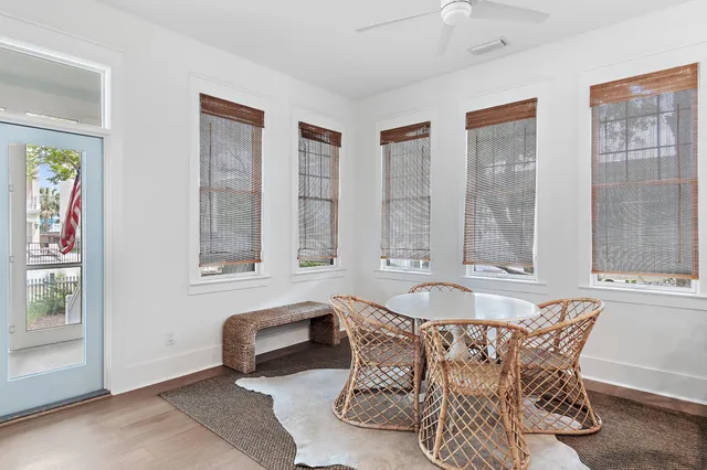a living room with furniture and windows