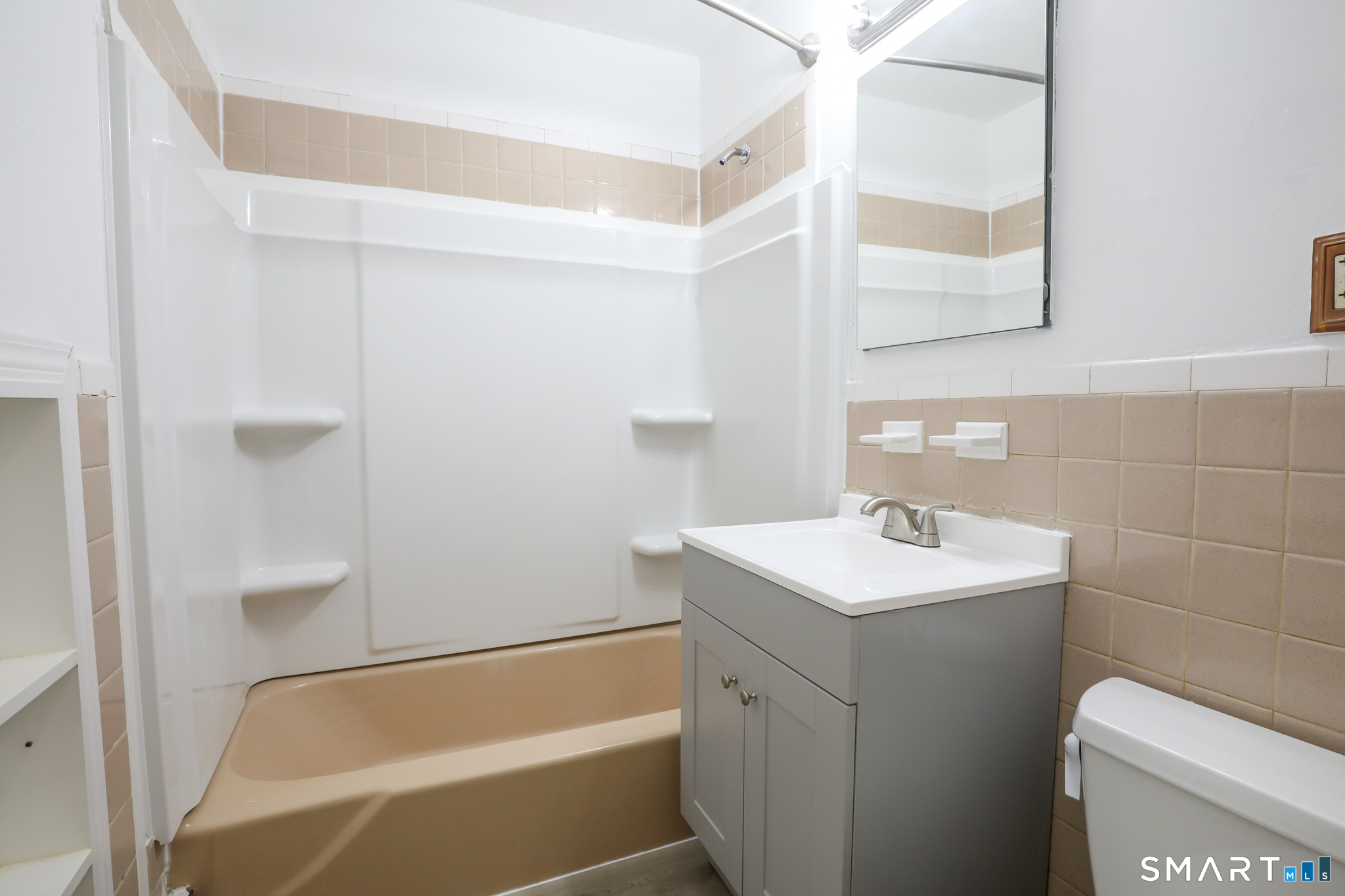1 Camelot Drive, Unit 2 Bloomfield, CT 06002 - Photo 12 of 24 a bathroom with a sink a toilet and shower