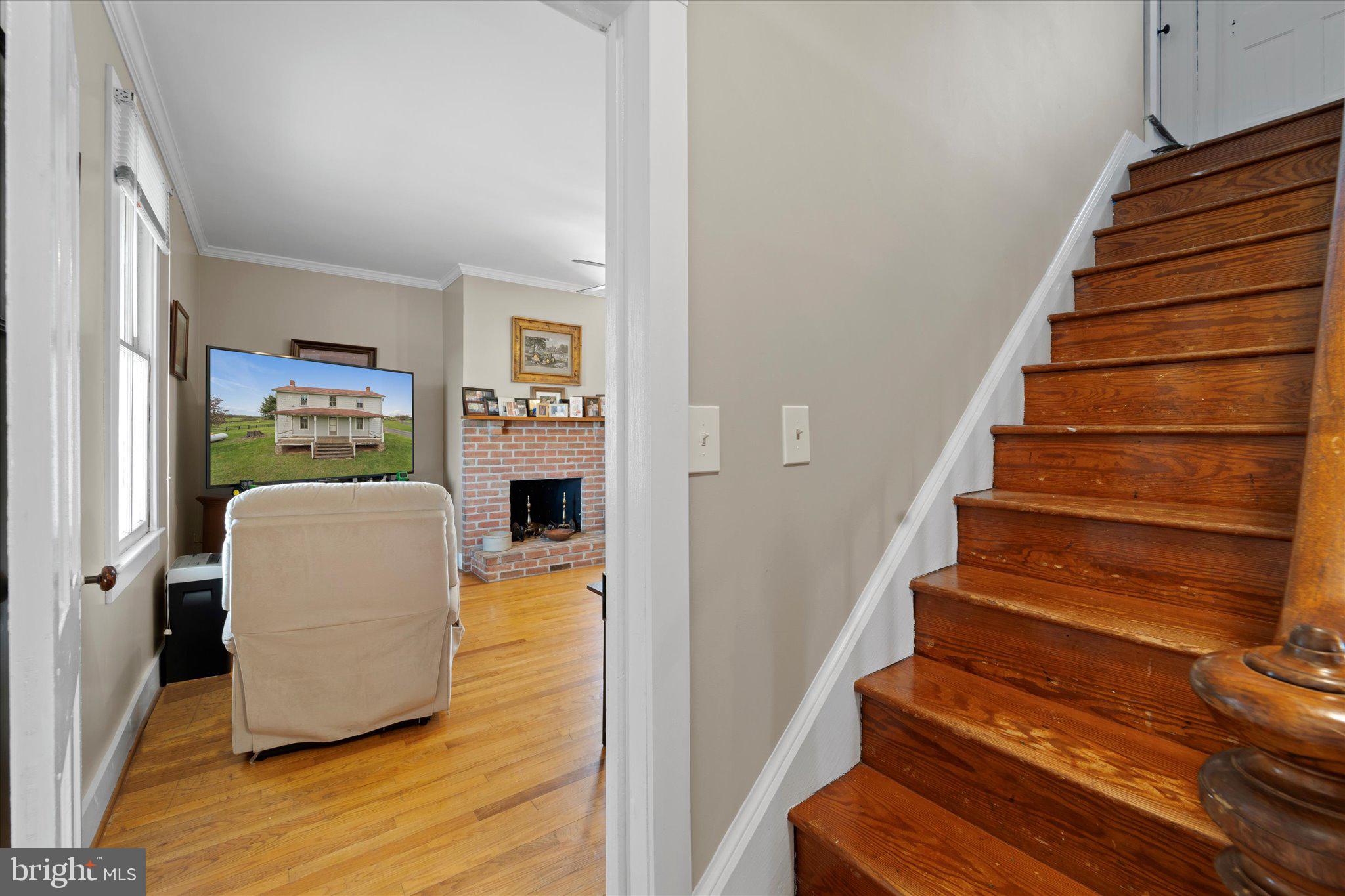 42880 Spinks Ferry Road Leesburg, VA 20176 - Photo 15 of 43 a view of entryway and hall with wooden floor