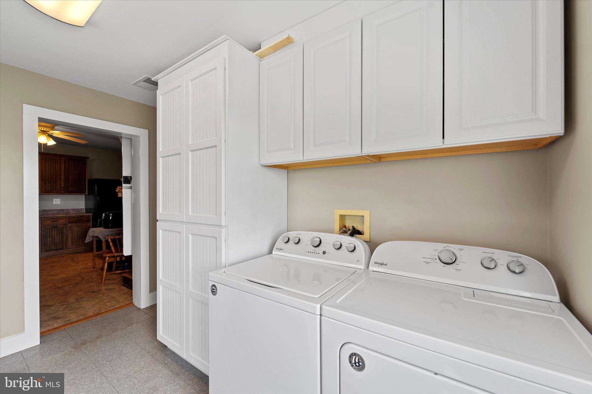 42880 Spinks Ferry Road Leesburg, VA 20176 - Photo 24 of 43 a utility room with dryer and washer
