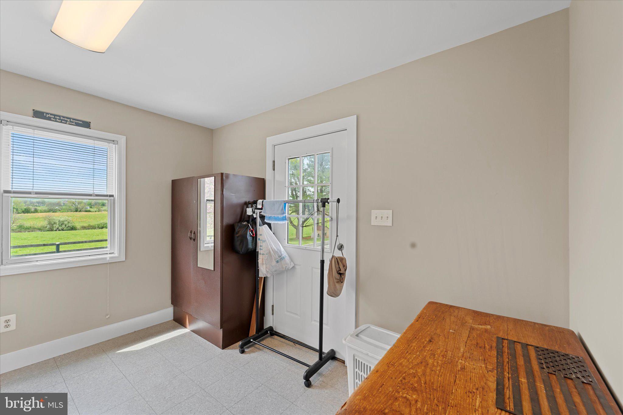 42880 Spinks Ferry Road Leesburg, VA 20176 - Photo 25 of 43 a view of a livingroom with a workspace