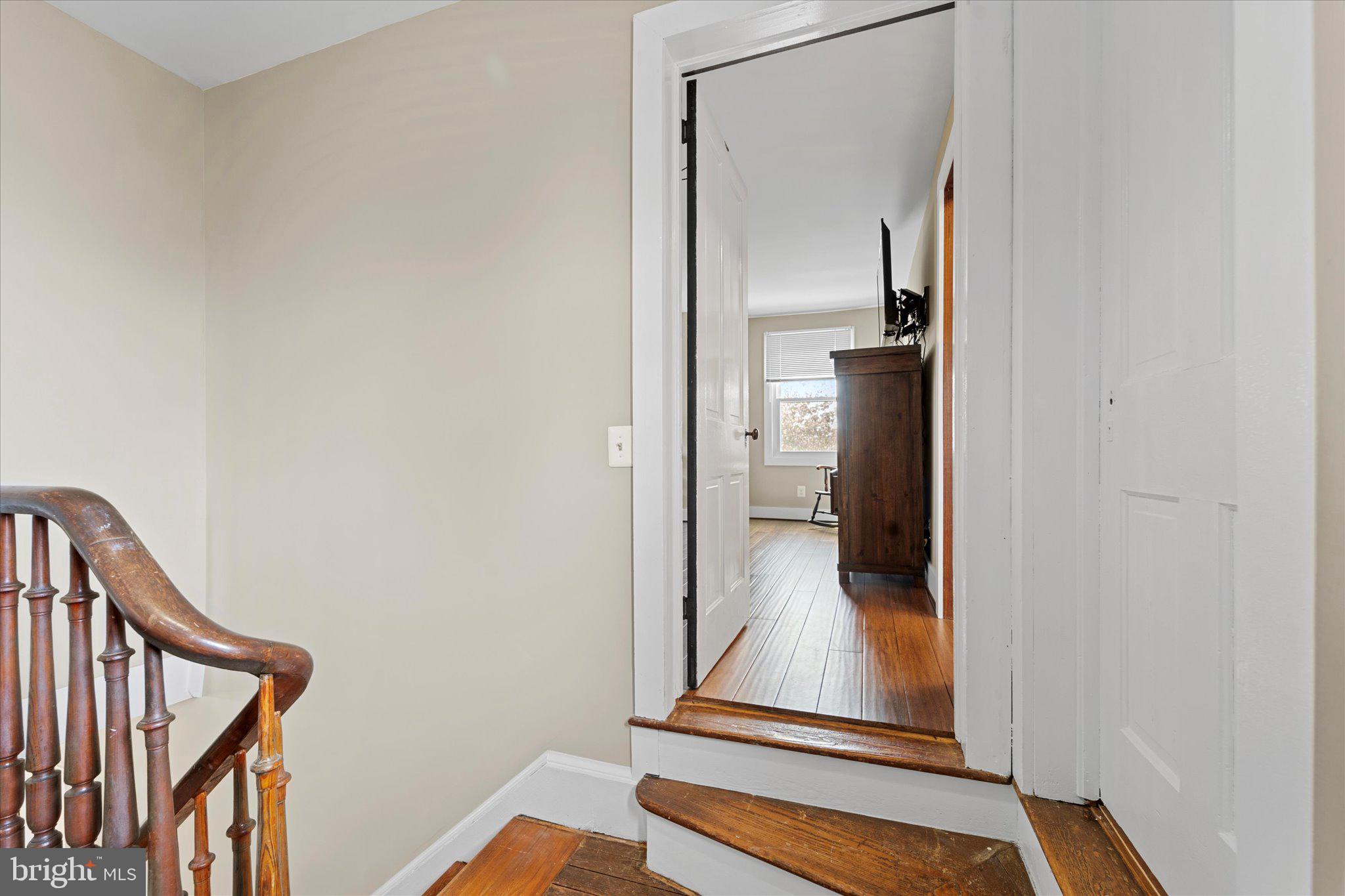 42880 Spinks Ferry Road Leesburg, VA 20176 - Photo 27 of 43 a view of a hallway with staircase