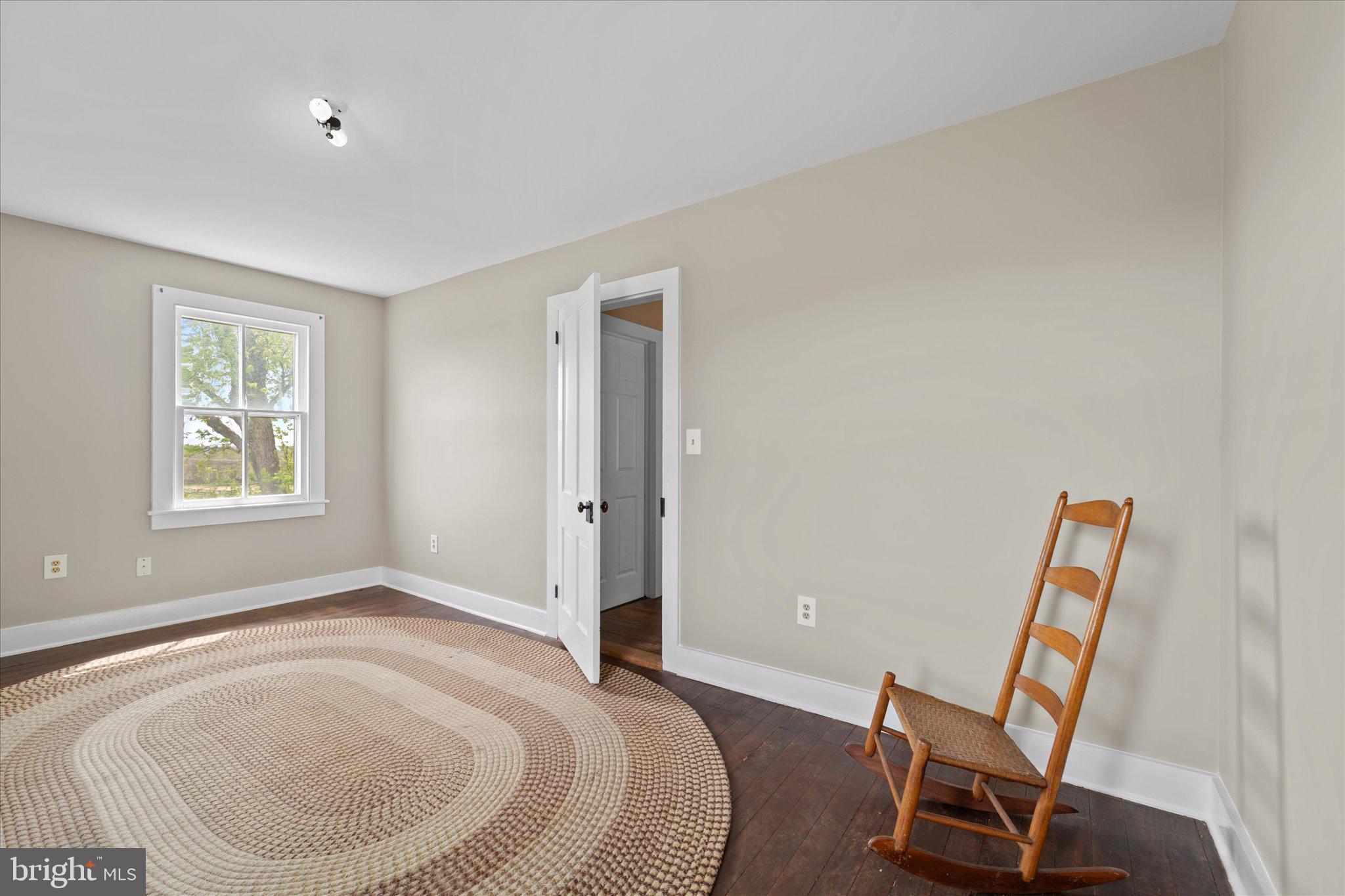 42880 Spinks Ferry Road Leesburg, VA 20176 - Photo 38 of 43 a bedroom with a bed and a window