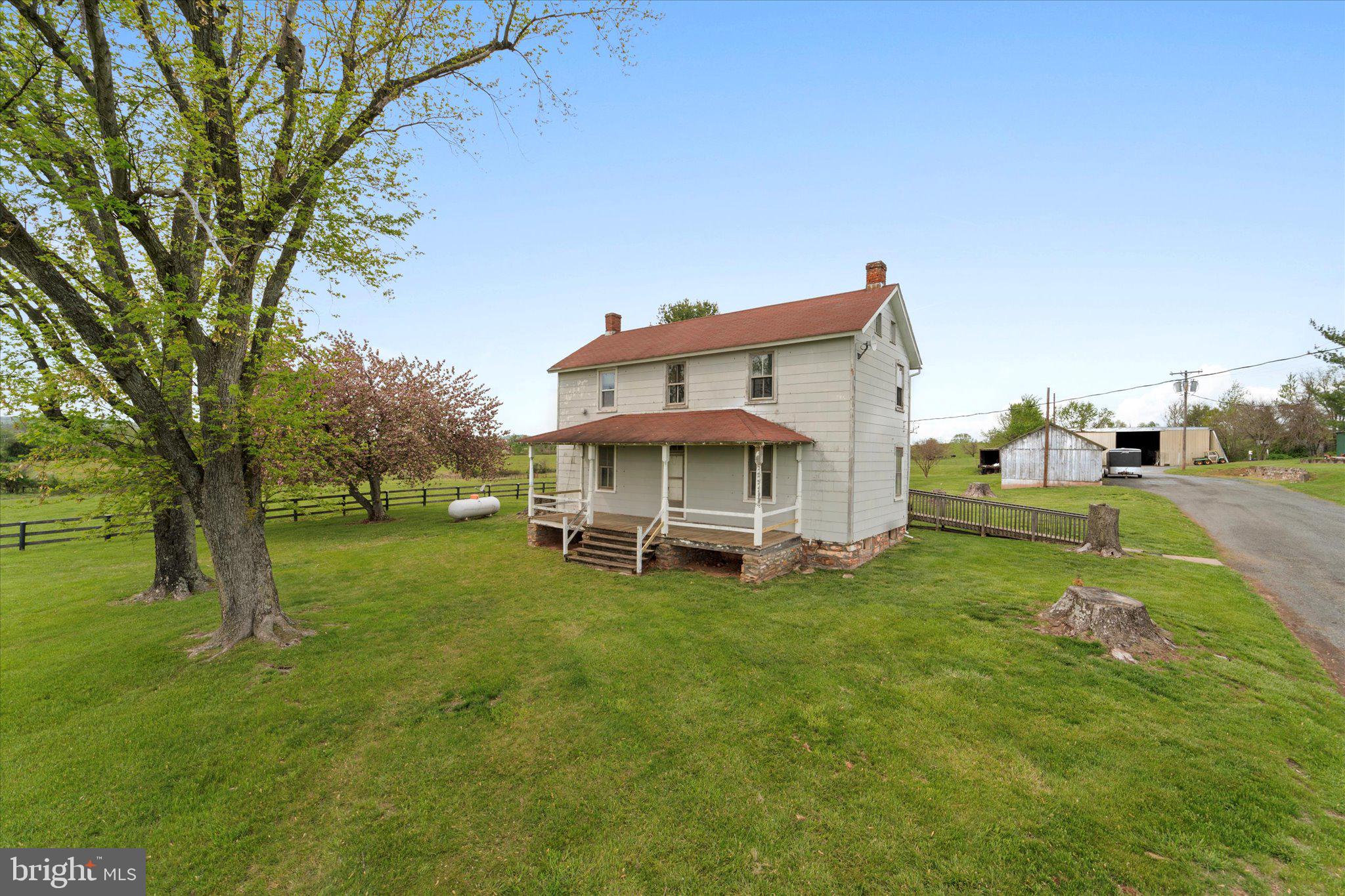 42880 Spinks Ferry Road Leesburg, VA 20176 - Photo 7 of 43 a view of a house with a big yard