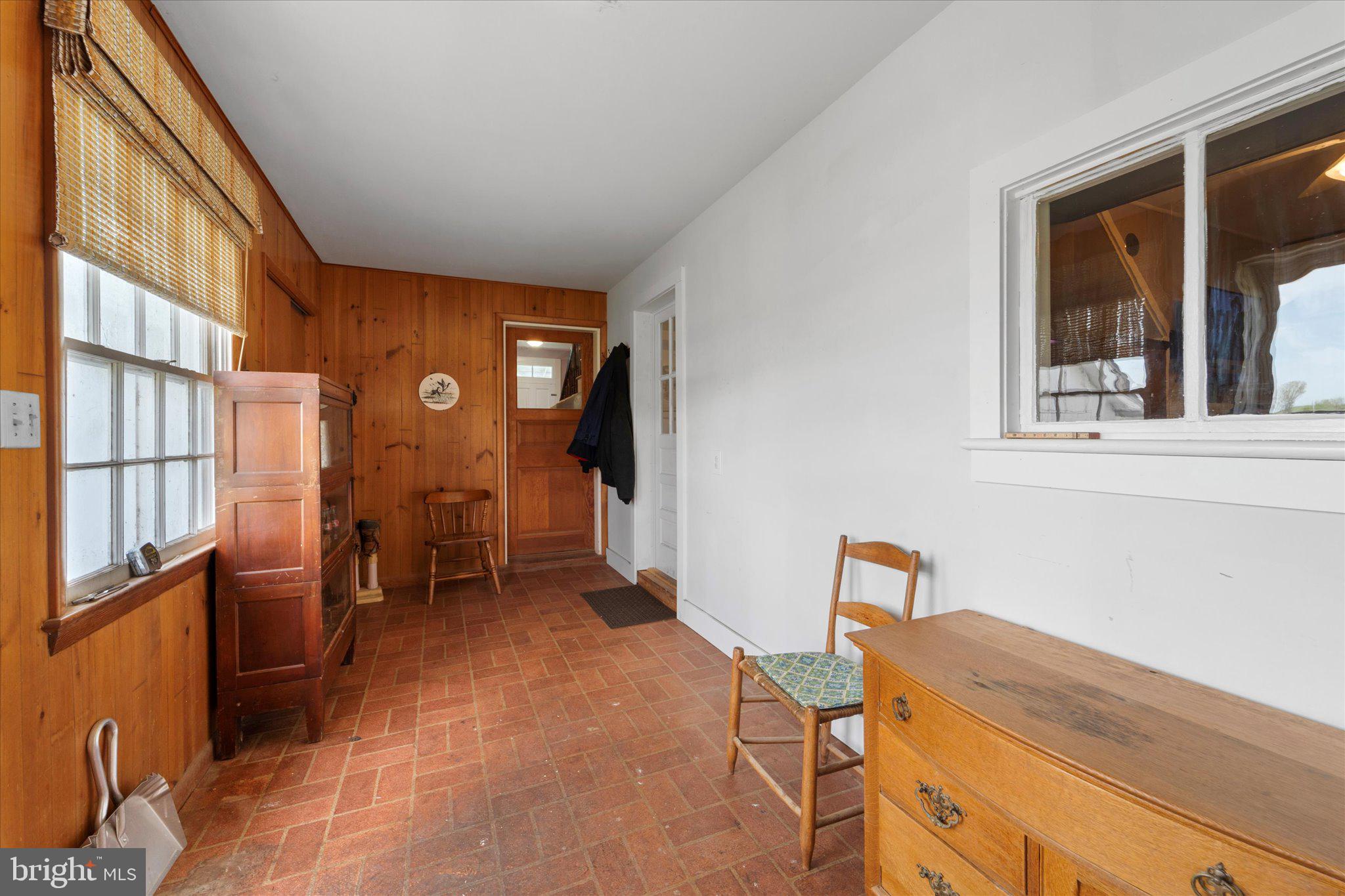 42880 Spinks Ferry Road Leesburg, VA 20176 - Photo 10 of 43 a view of a livingroom with furniture and windows