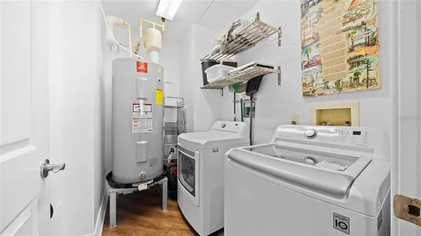 a utility room with dryer and washer