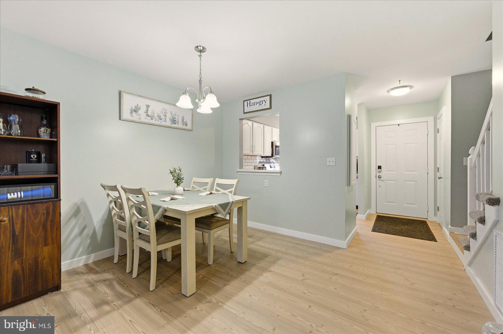 730 Canvasback Court Salisbury, MD 21804 - Photo 16 of 43 a view of a dining room with furniture window and wooden floor