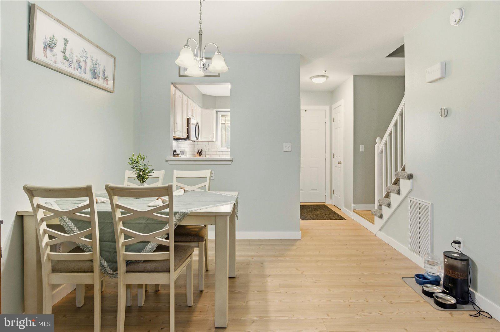 730 Canvasback Court Salisbury, MD 21804 - Photo 17 of 43 a view of a dining room with furniture and wooden floor