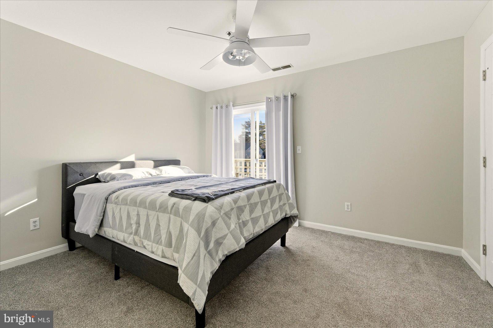 730 Canvasback Court Salisbury, MD 21804 - Photo 25 of 43 a bedroom with a bed and window
