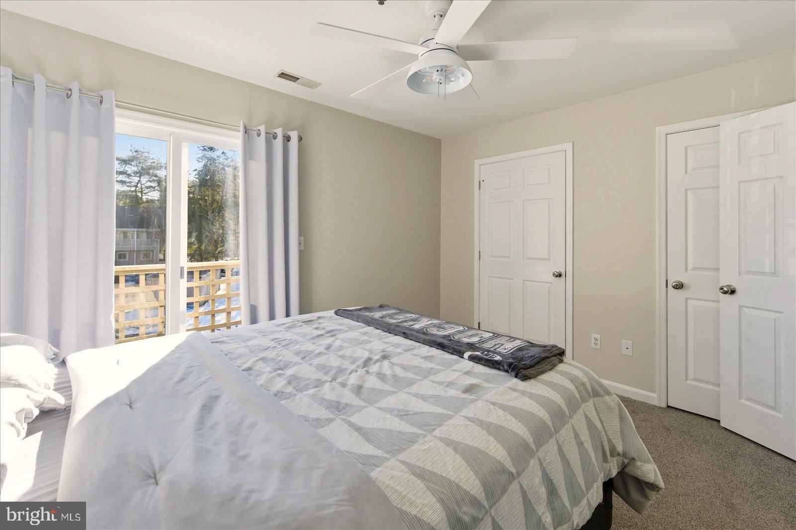 730 Canvasback Court Salisbury, MD 21804 - Photo 27 of 43 a bedroom with a large bed and a window