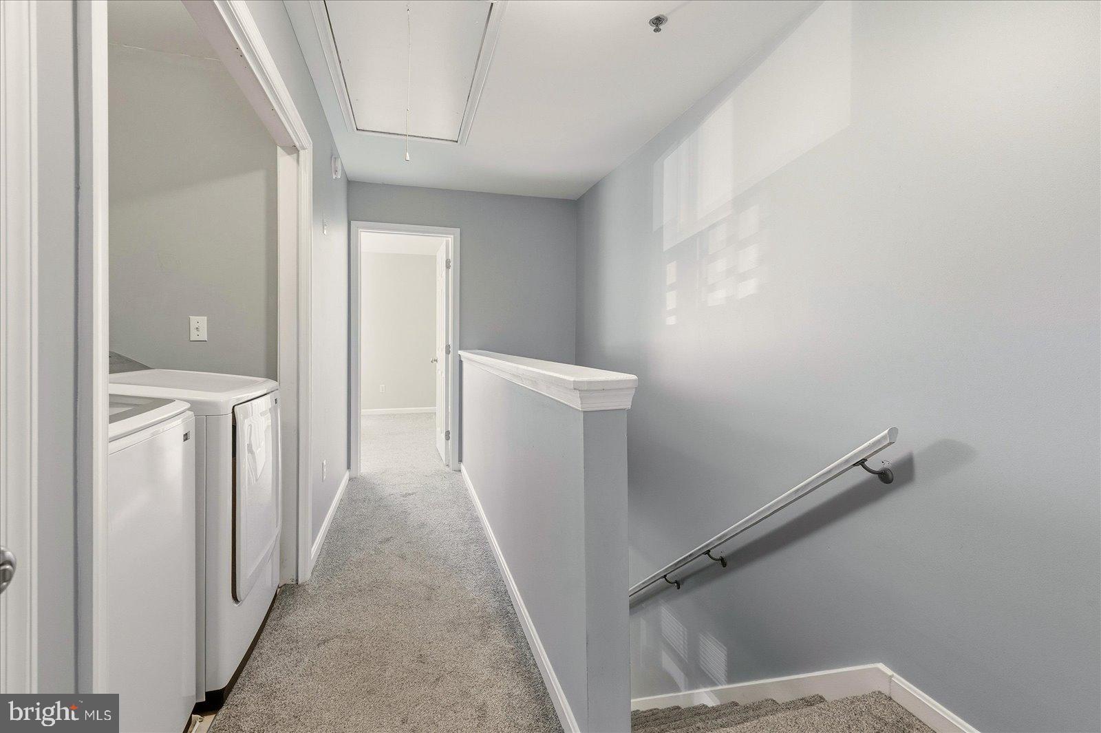 730 Canvasback Court Salisbury, MD 21804 - Photo 29 of 43 a view of a hallway with washer and dryer