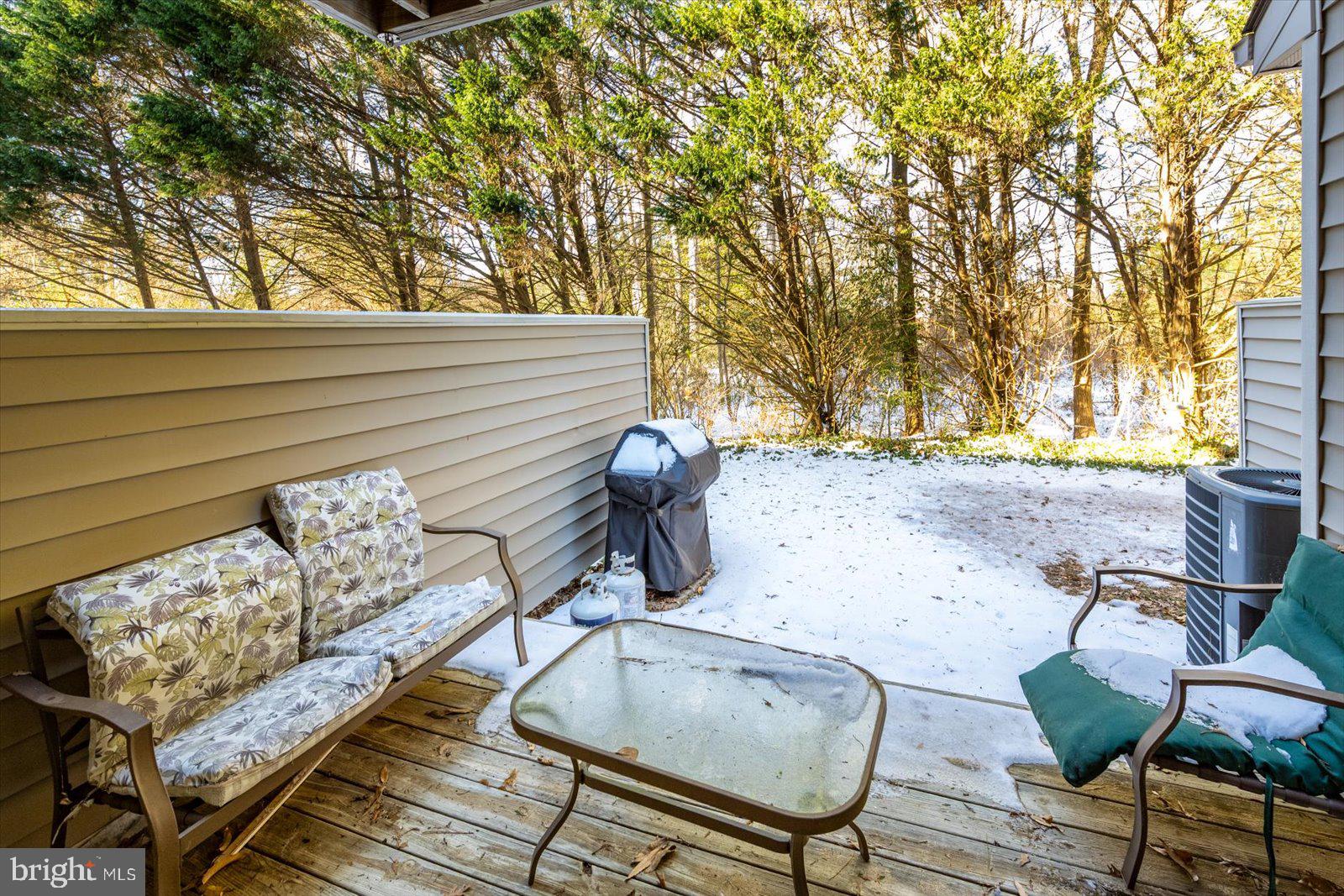 730 Canvasback Court Salisbury, MD 21804 - Photo 32 of 43 a backyard of a house with table and chairs