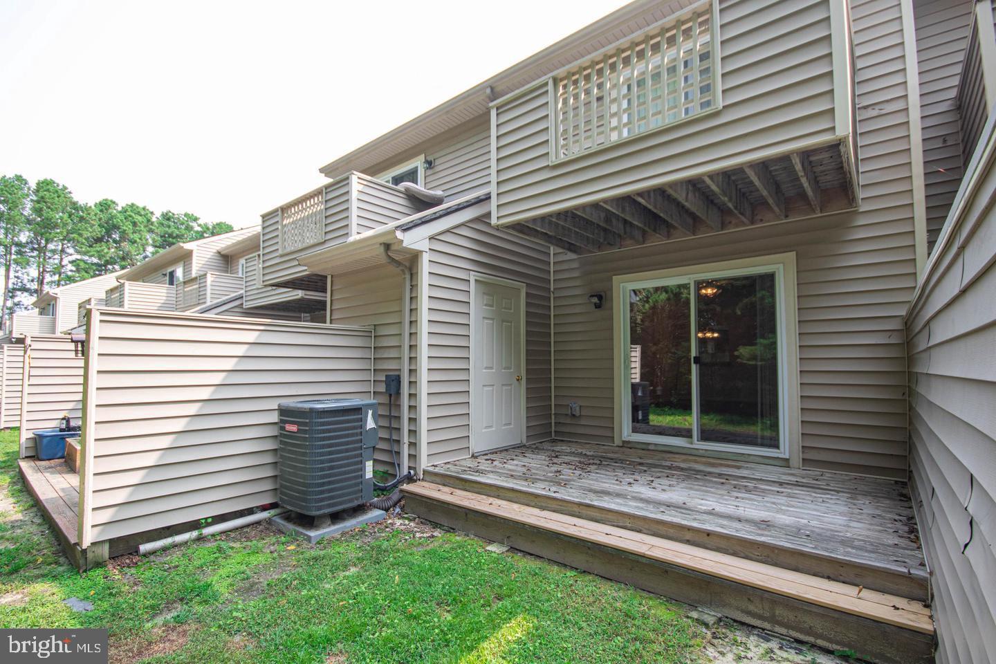 730 Canvasback Court Salisbury, MD 21804 - Photo 35 of 43 a view of a house with a yard and sitting area