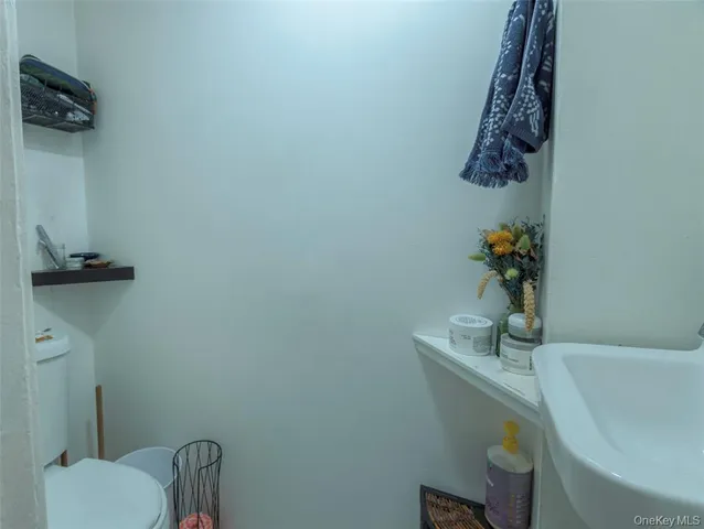 a bathroom with a shower and a sink