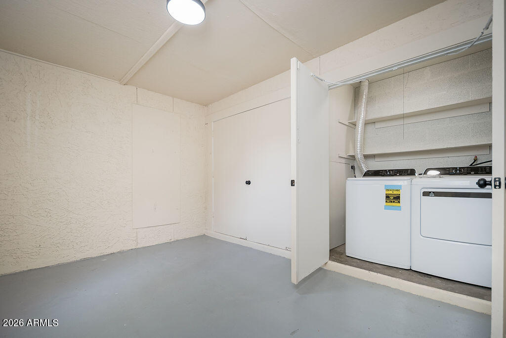 720 South Dobson Road, Unit 85 Mesa, AZ 85202 - Photo 21 of 25 a view of storage and utility room with washer and dryer