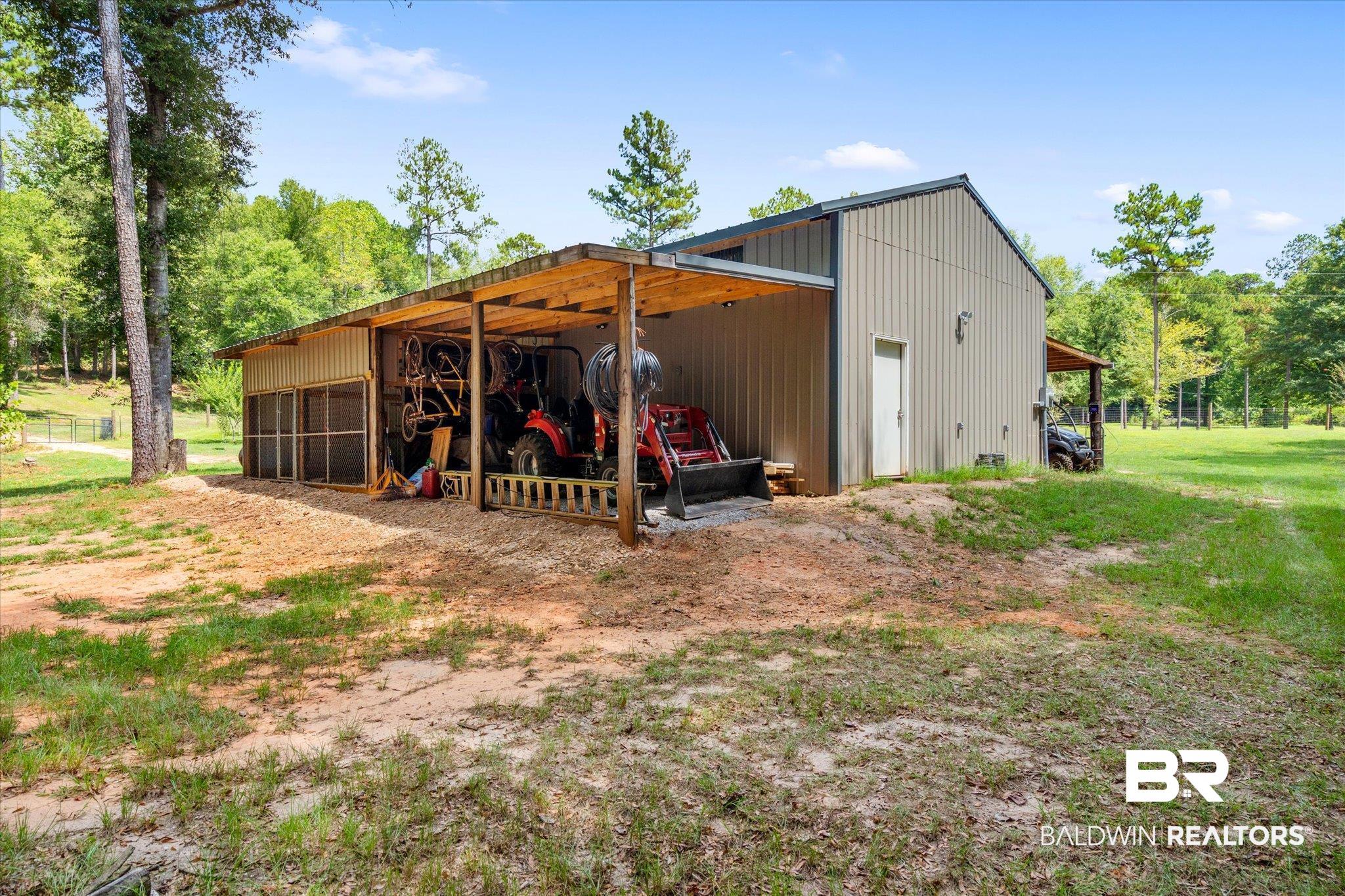 72 Limestone Drive Jackson, AL 36545 - Photo 32 of 38 View of outdoor structure featuring a garage