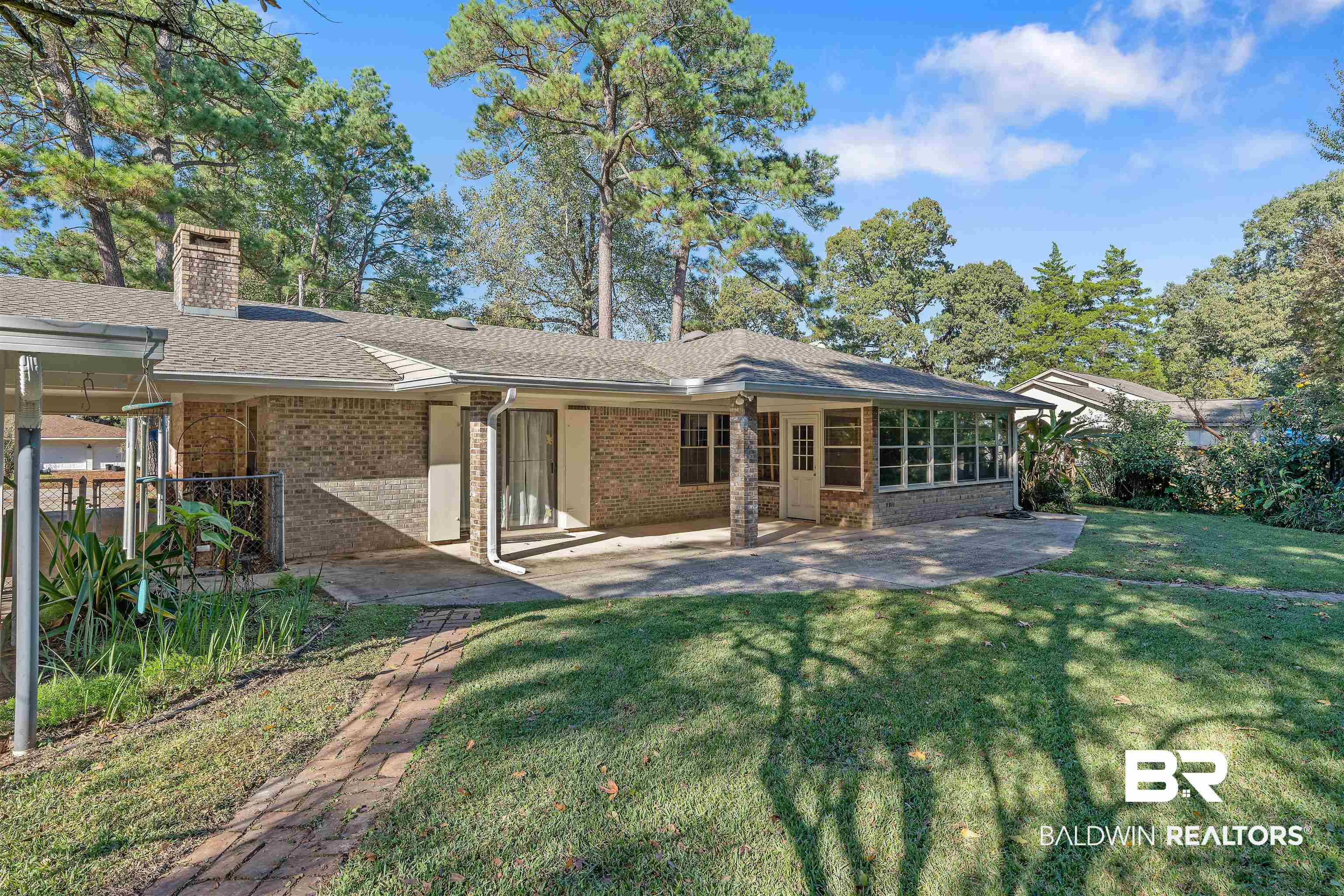 621 Spanish Main Spanish Fort, AL 36527 - Photo 7 of 29 Back of property featuring a yard and a patio