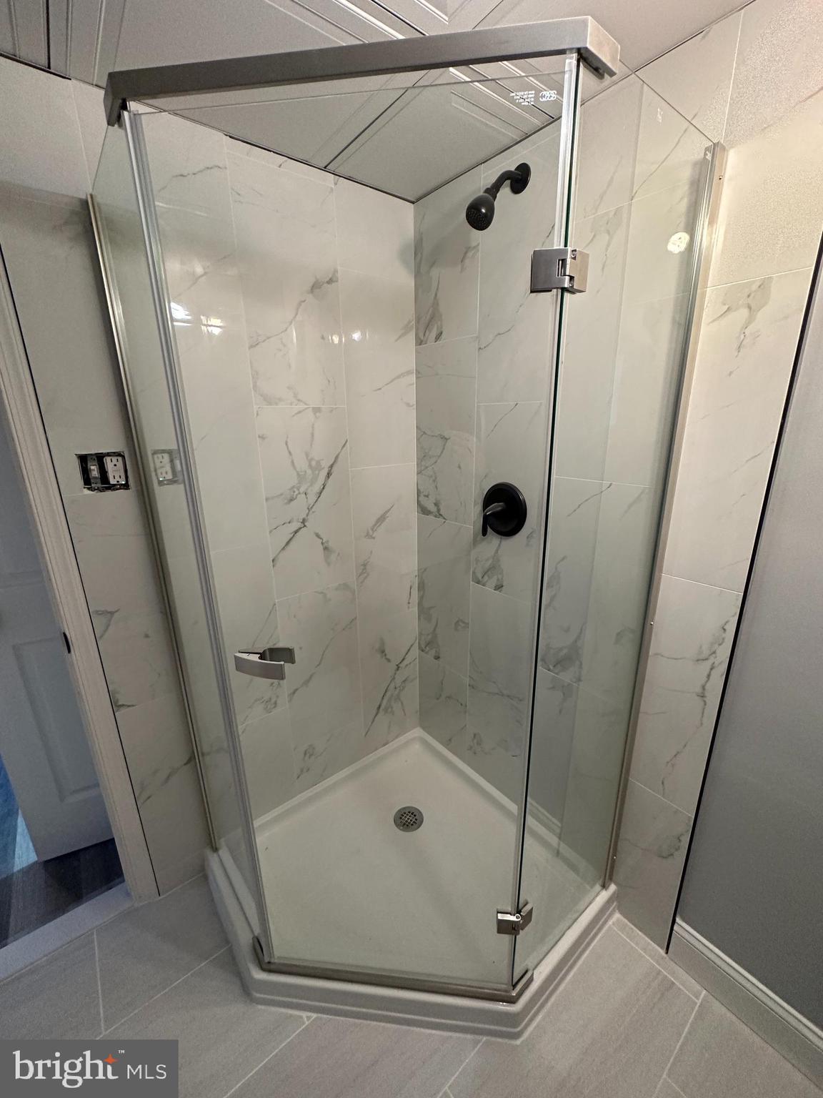 1575 West Street Road, Unit 922 Warminster, PA 18974 - Photo 11 of 16 a bathroom with a shower