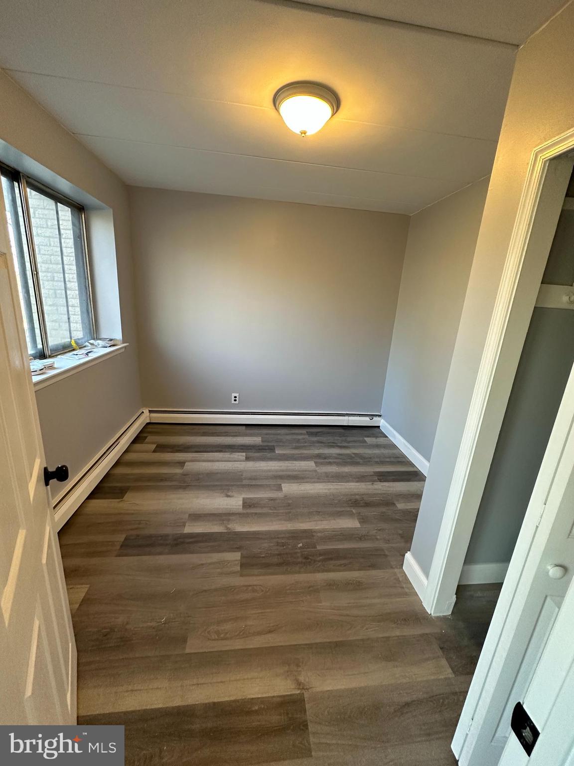 1575 West Street Road, Unit 922 Warminster, PA 18974 - Photo 13 of 16 a view of room with window and stairs