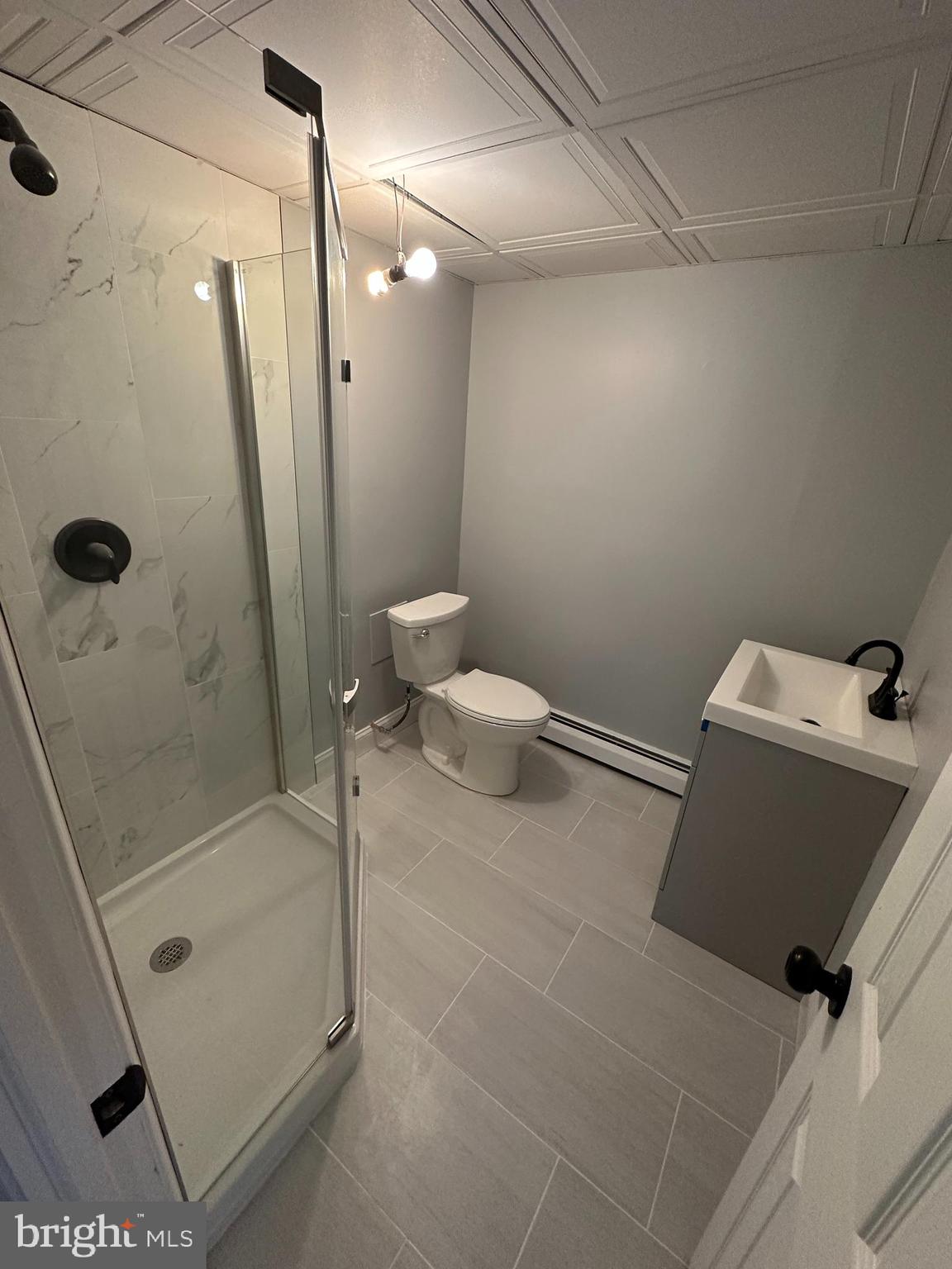 1575 West Street Road, Unit 922 Warminster, PA 18974 - Photo 10 of 16 a bathroom with a shower and a toilet