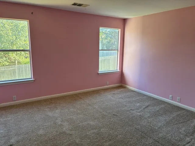 an empty room with a window