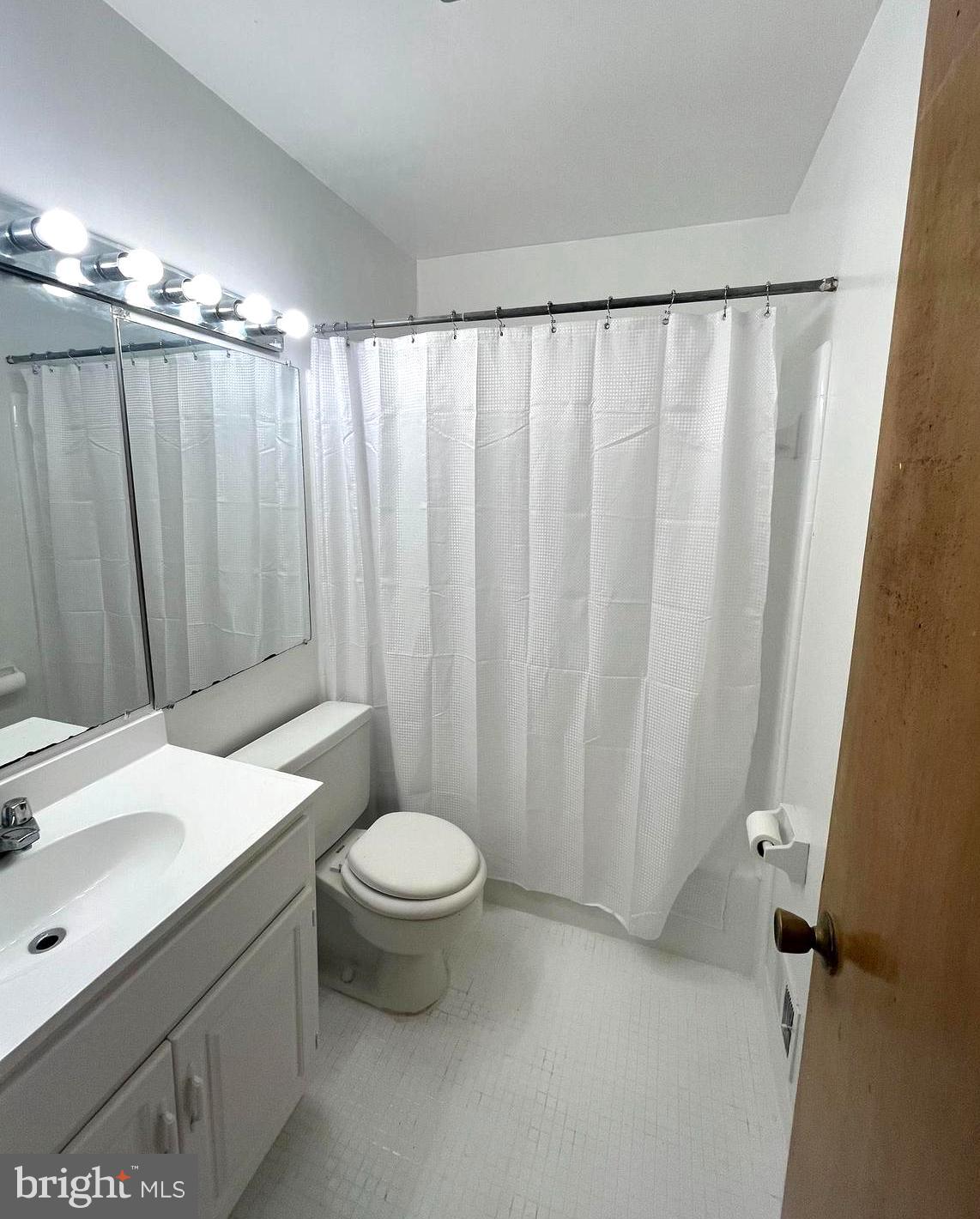 2943 Sunset Lane Suitland, MD 20746 - Photo 13 of 24 a bathroom with a sink and a toilet