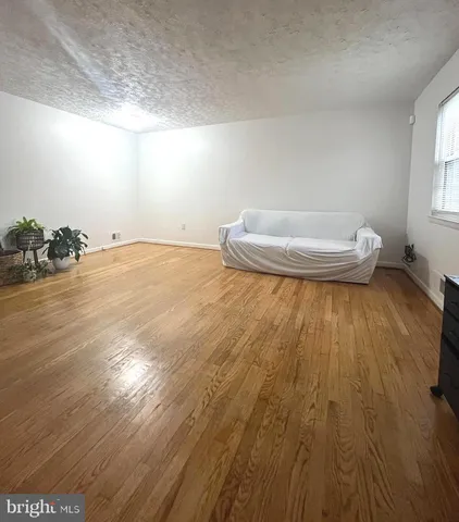 a kitchen with a sink and a stove