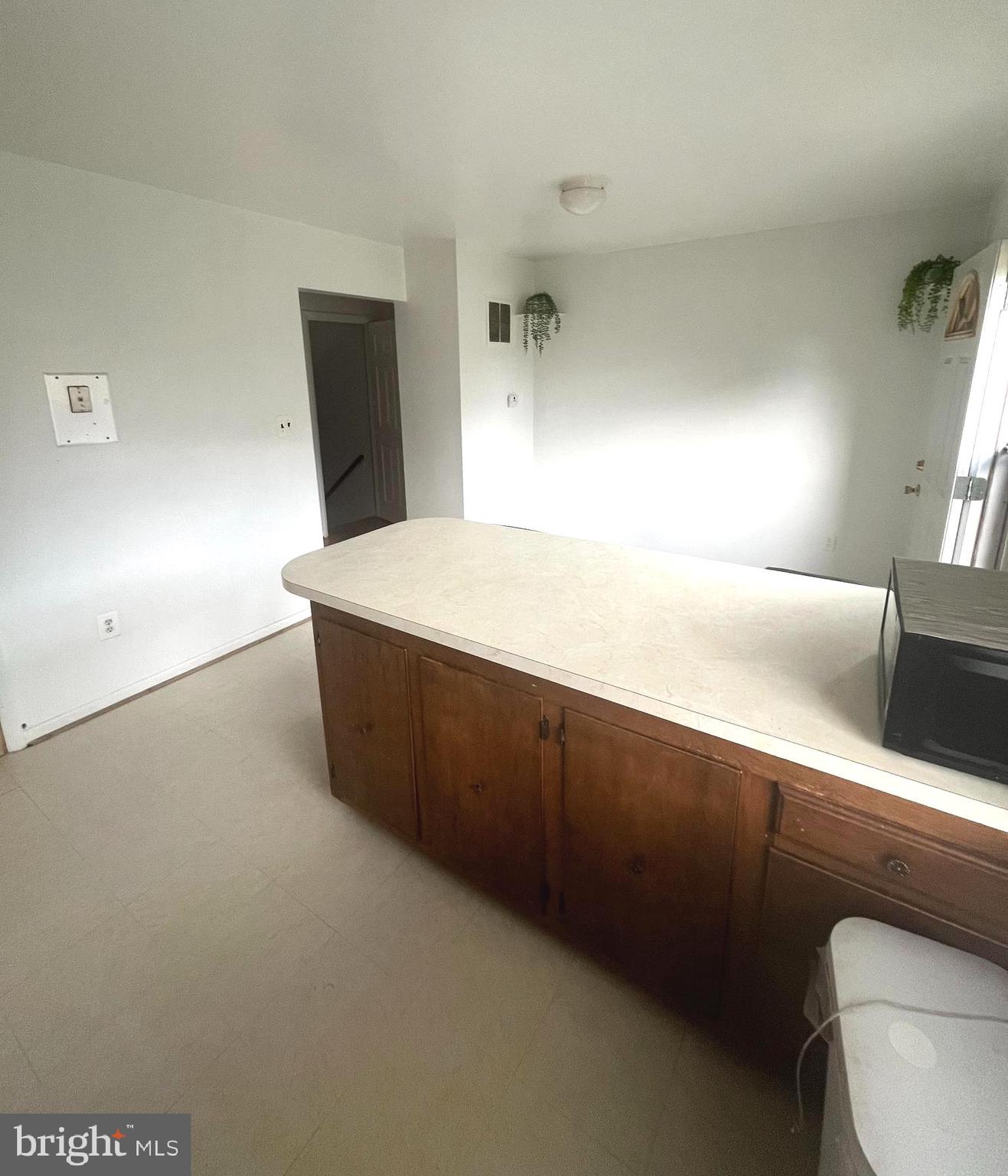 2943 Sunset Lane Suitland, MD 20746 - Photo 17 of 24 a room with a bed and a dresser