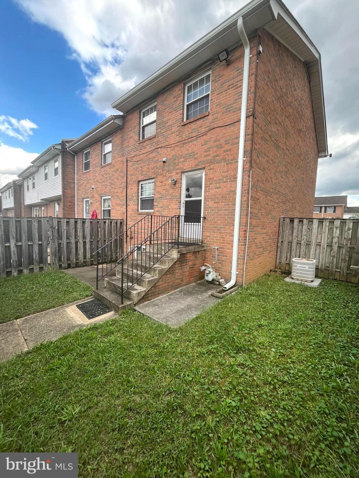 2943 Sunset Lane Suitland, MD 20746 - Photo 3 of 24 a front view of a house with garden