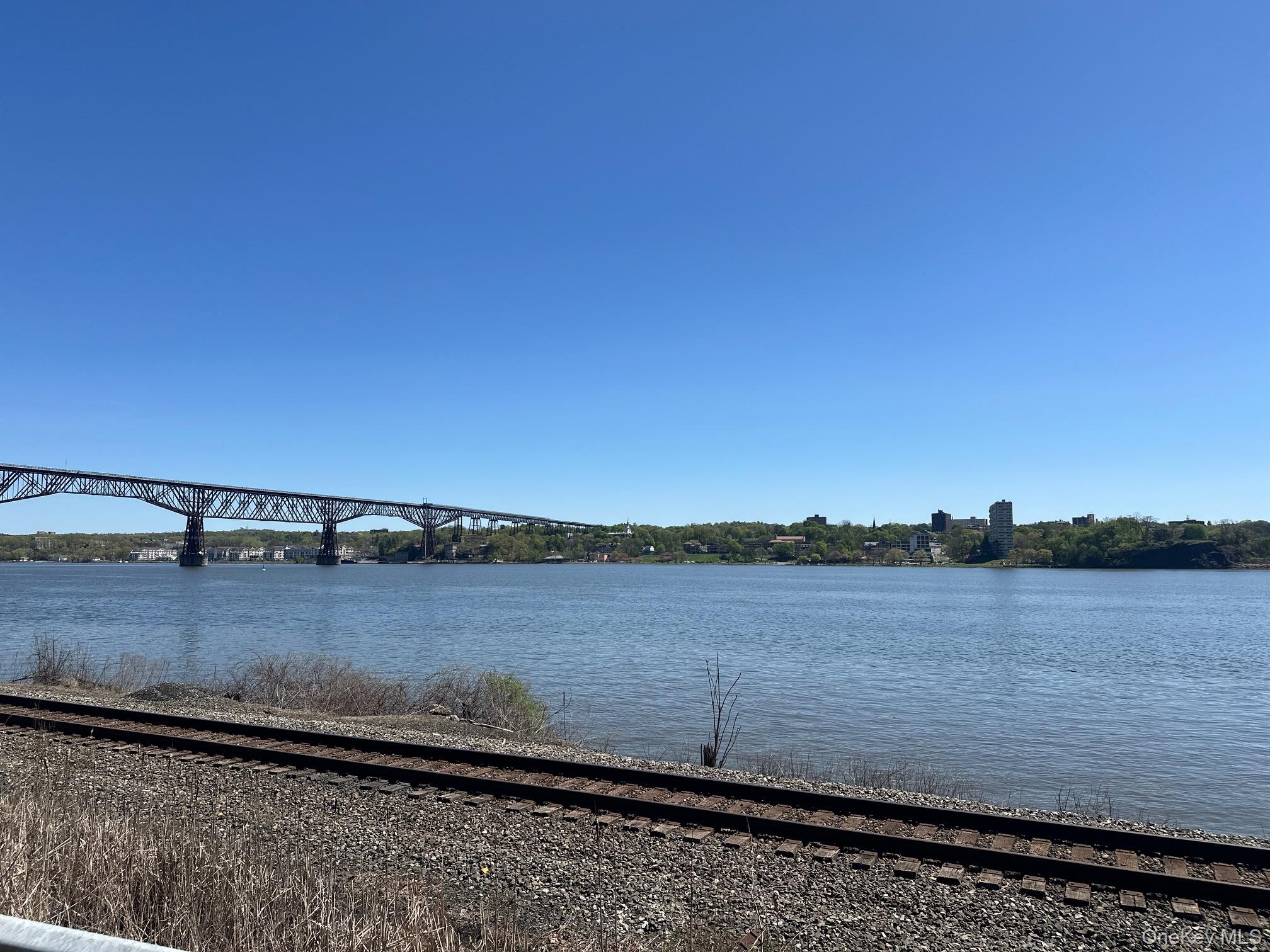 29 Oakes Road Highland, NY 12528 - Photo 6 of 7 a view of a lake with houses in background