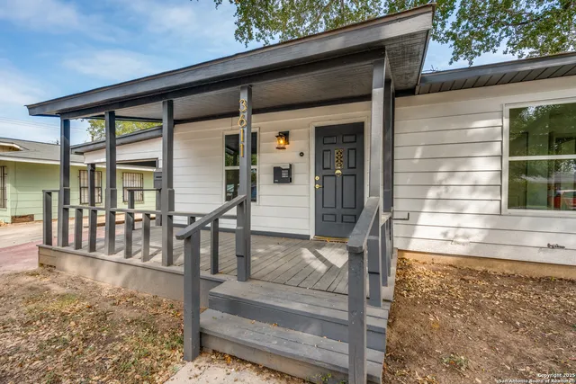 a view of living room and balcony