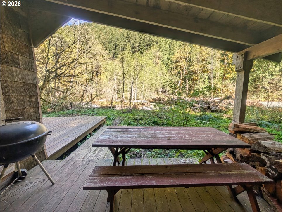 30460 Road 12 Rhododendron, OR 97049 - Photo 26 of 29 a view of a wooden chairs and table in patio