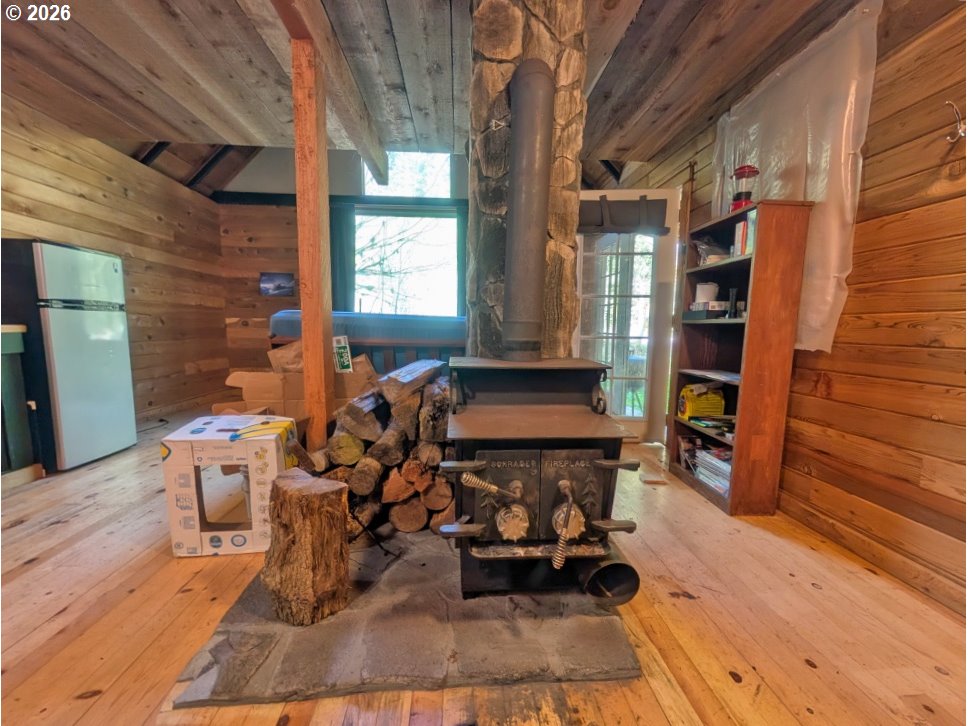 30460 Road 12 Rhododendron, OR 97049 - Photo 7 of 29 a room with wooden furniture and a window