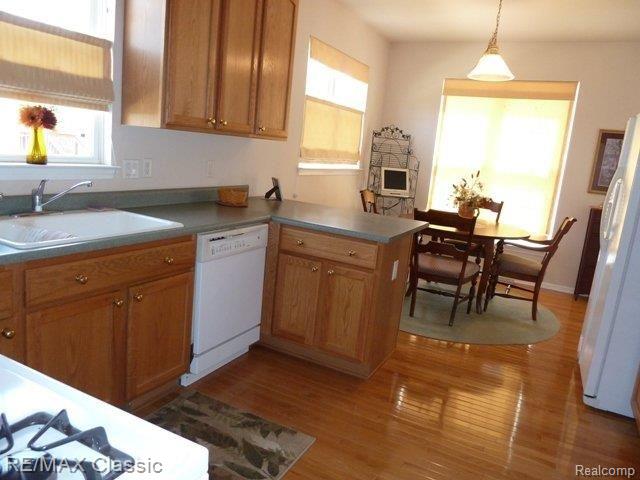 41654 Mitchell Road, Unit 52 Novi, MI 48377 - Photo 7 of 23 GATHERING KITCHEN
