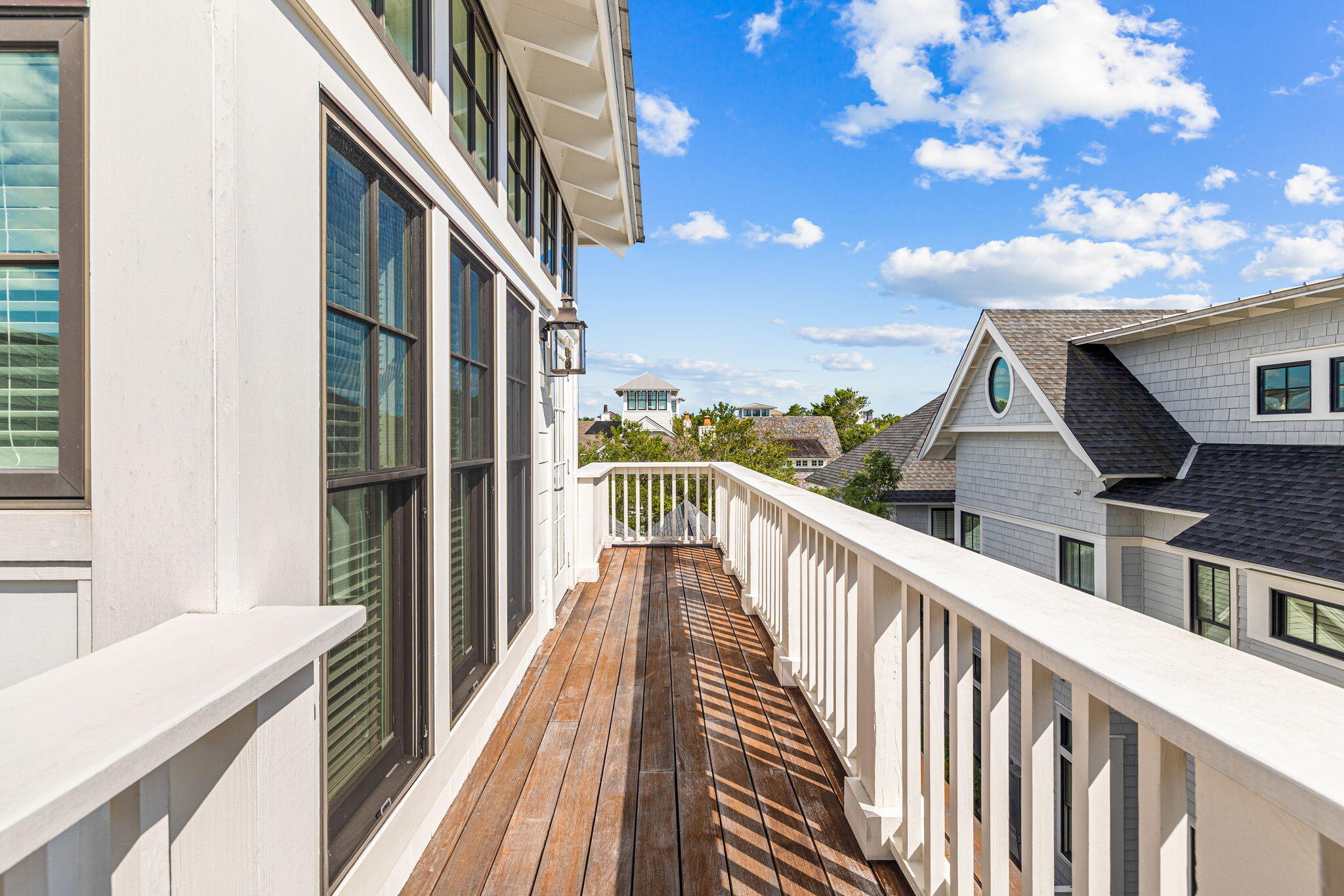 30 South Watch Tower Ln Inlet Beach Inlet Beach, FL 32461 - Photo 41 of 77 a view of a balcony with wooden floor and fence