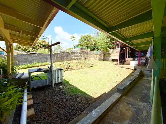 a view of swimming pool with a patio