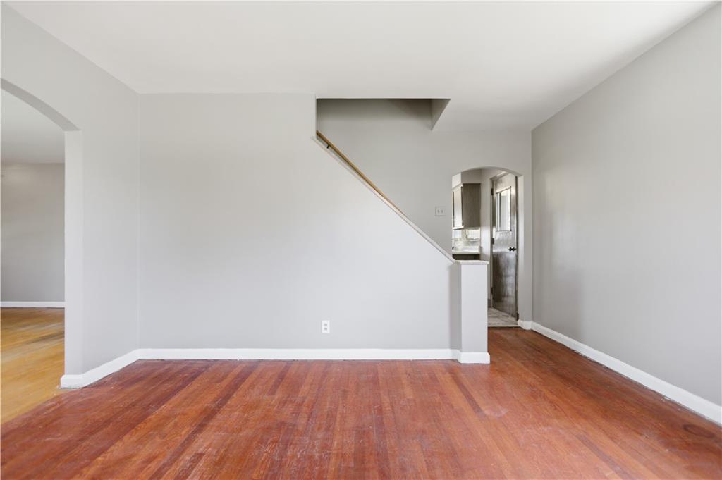 64 Harmon Creek Road Burgettstown, PA 15021 - Photo 8 of 29 a view of hallway with stairs and wooden floor