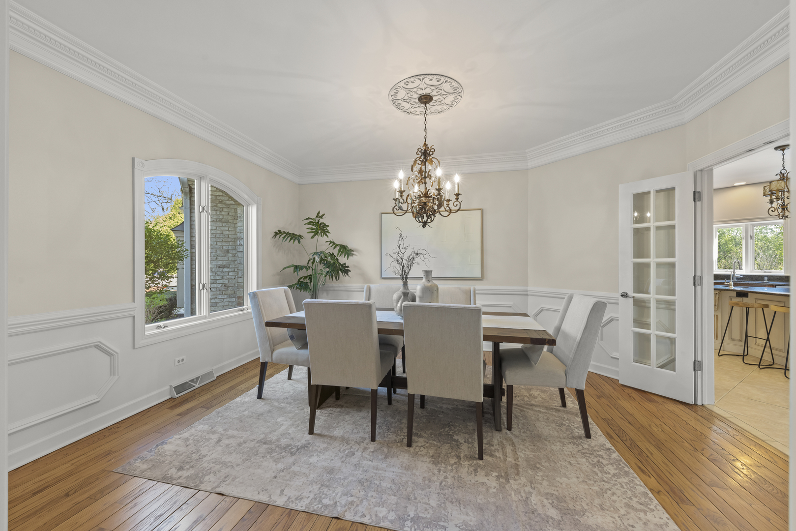 1S151 Winfield Road Wheaton, IL 60189 - Photo 12 of 73 a view of a dining room with furniture window and wooden floor