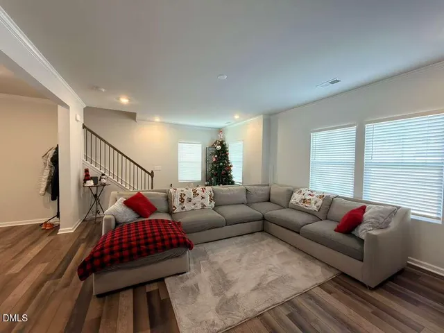 a living room with furniture and a couch