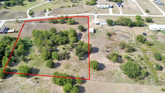 a view of a bench in a yard