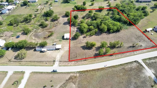 a view of a wooden floor with a bench