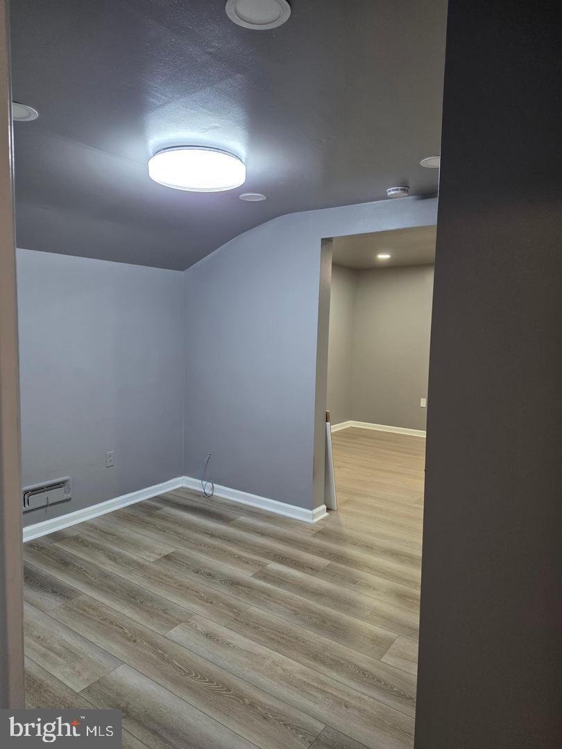 1407 Adamsview Road Baltimore, MD 21228 - Photo 26 of 40 a view of an empty room