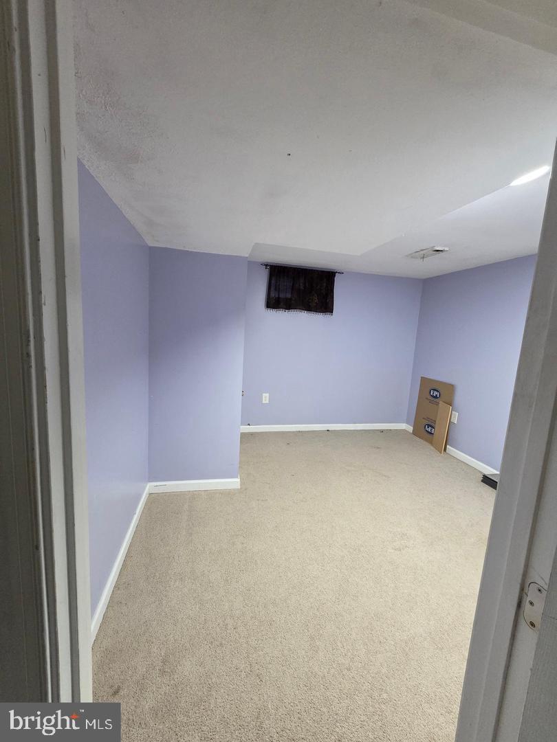 1407 Adamsview Road Baltimore, MD 21228 - Photo 36 of 40 a view of an empty room