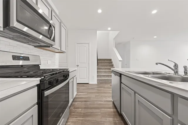 a view of a patio with a yard