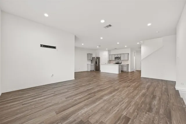 a view of entryway with wooden floor