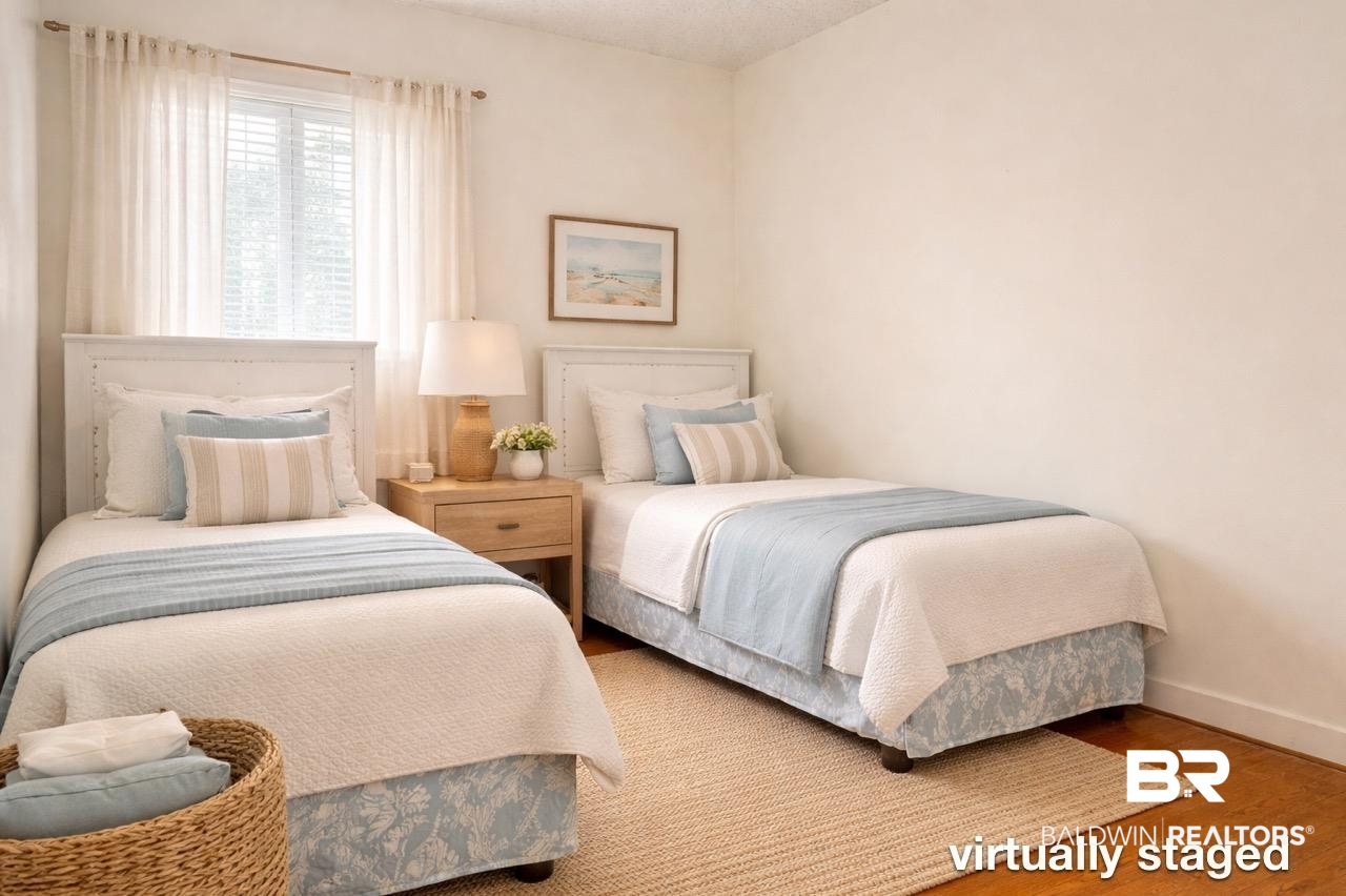156 Pier Avenue Fairhope, AL 36532 - Photo 15 of 41 Bedroom featuring wood finished floors and baseboards