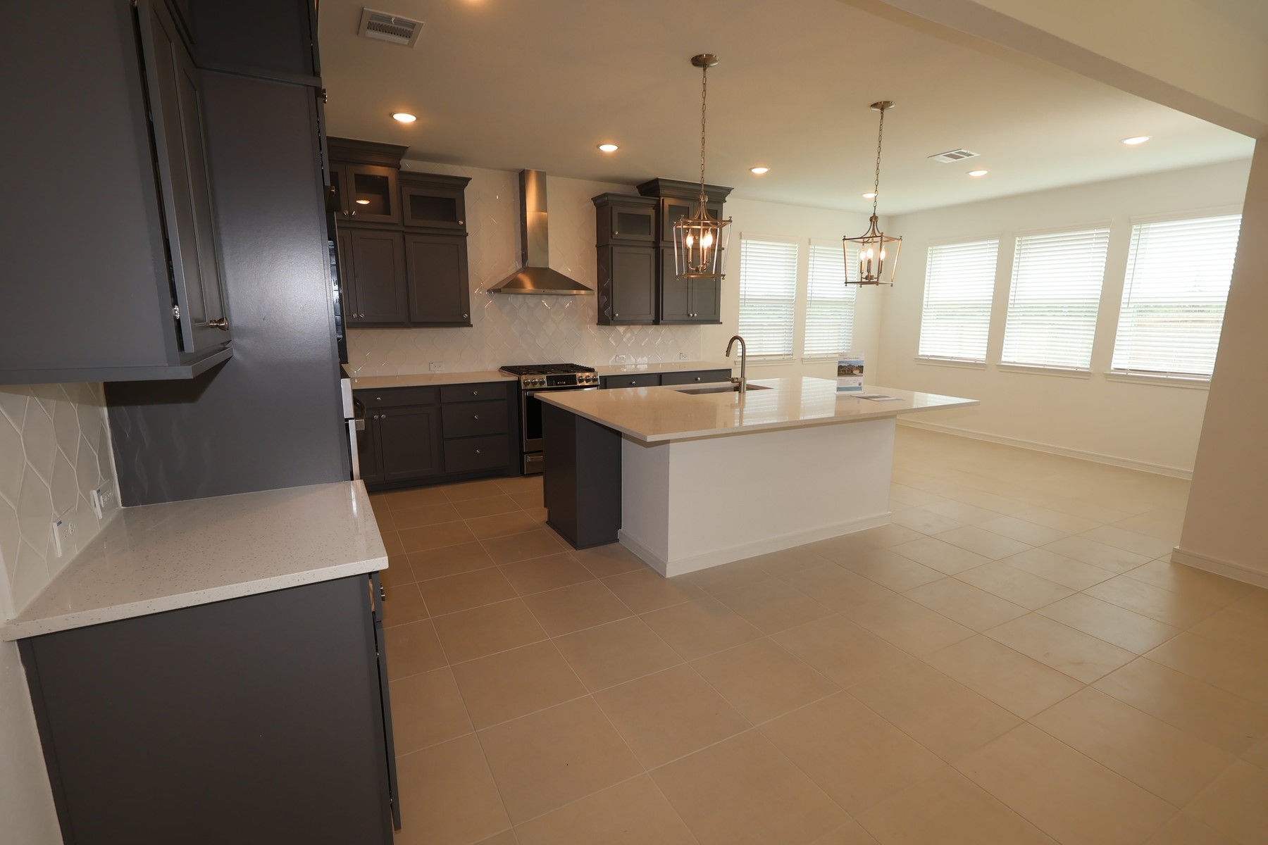 3214 Rios Court League City, TX 77573 - Photo 5 of 35 Gorgeous kitchen and sun-lit dining area