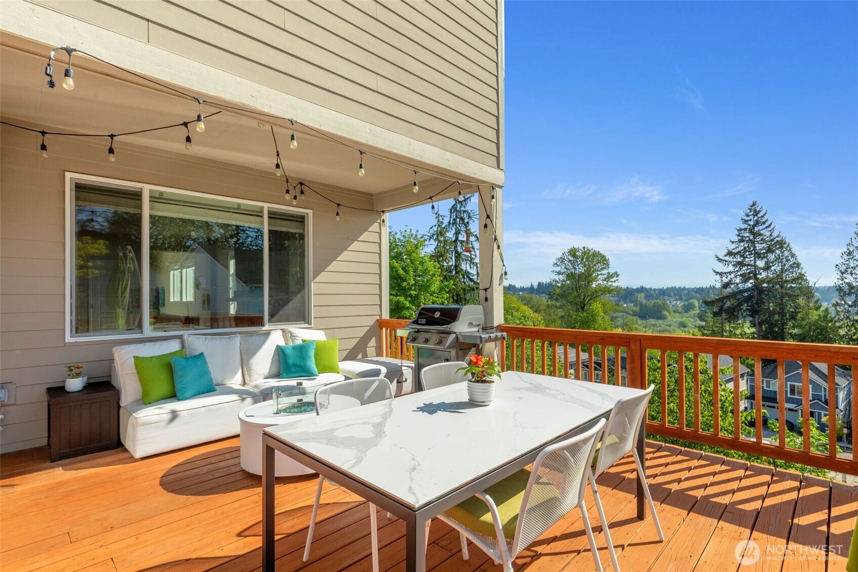 216 178th Street Southeast Bothell, WA 98012 - Photo 16 of 40 a view of a patio with a table and chairs